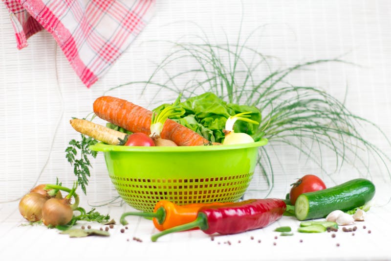 Garden fresh salad with colorful vegetables and vinaigrette