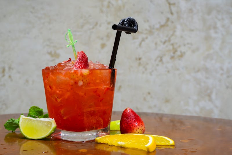 Fresh strawberry lemonade with ice and mint garnish