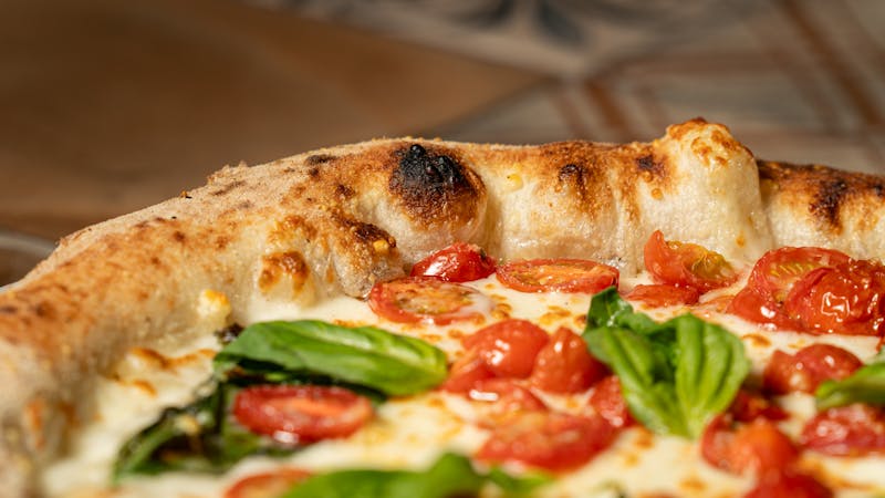 Classic Margherita mod pizza with fresh mozzarella and basil