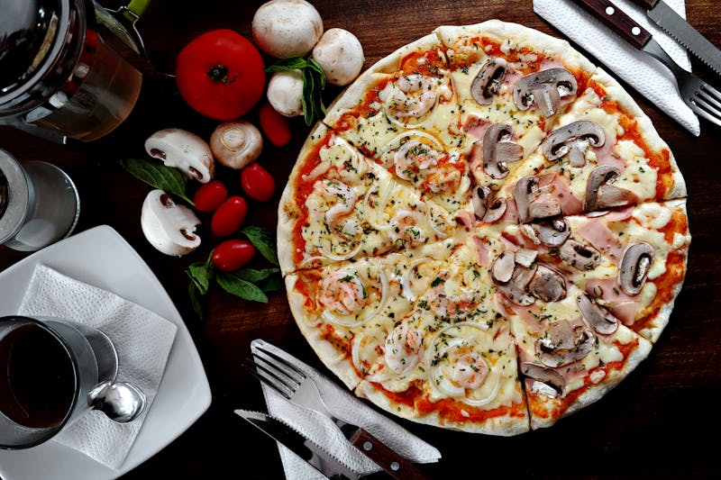 Veggie Supreme pizza loaded with colorful fresh vegetables